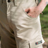 Beige cargo bug pants with a visible brand tag -OriginalBug Shirt Company