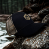 Black ball cap with mesh camo back, Obsc logo, adjsutable